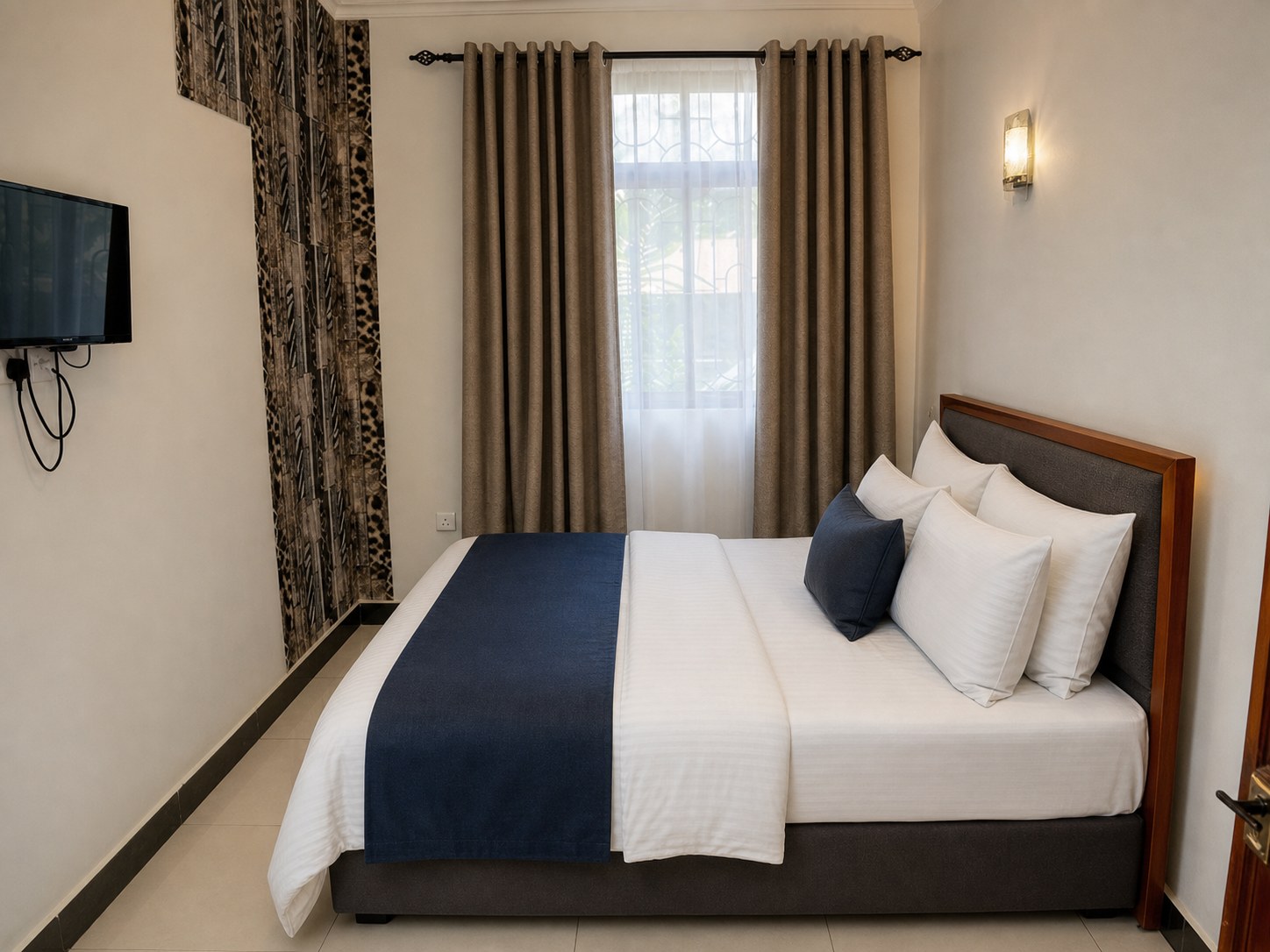 Guest room at The Diplomat Hotel &amp; Conference Center (DHCC)