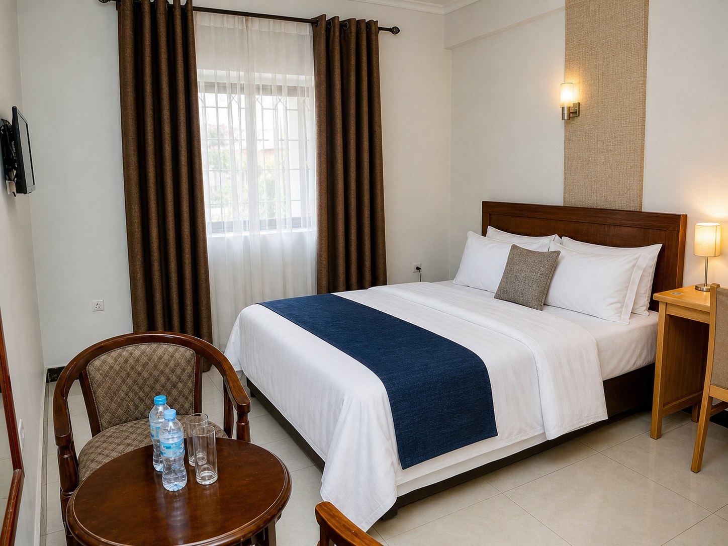 Guest room at The Diplomat Hotel & Conference Center (DHCC)